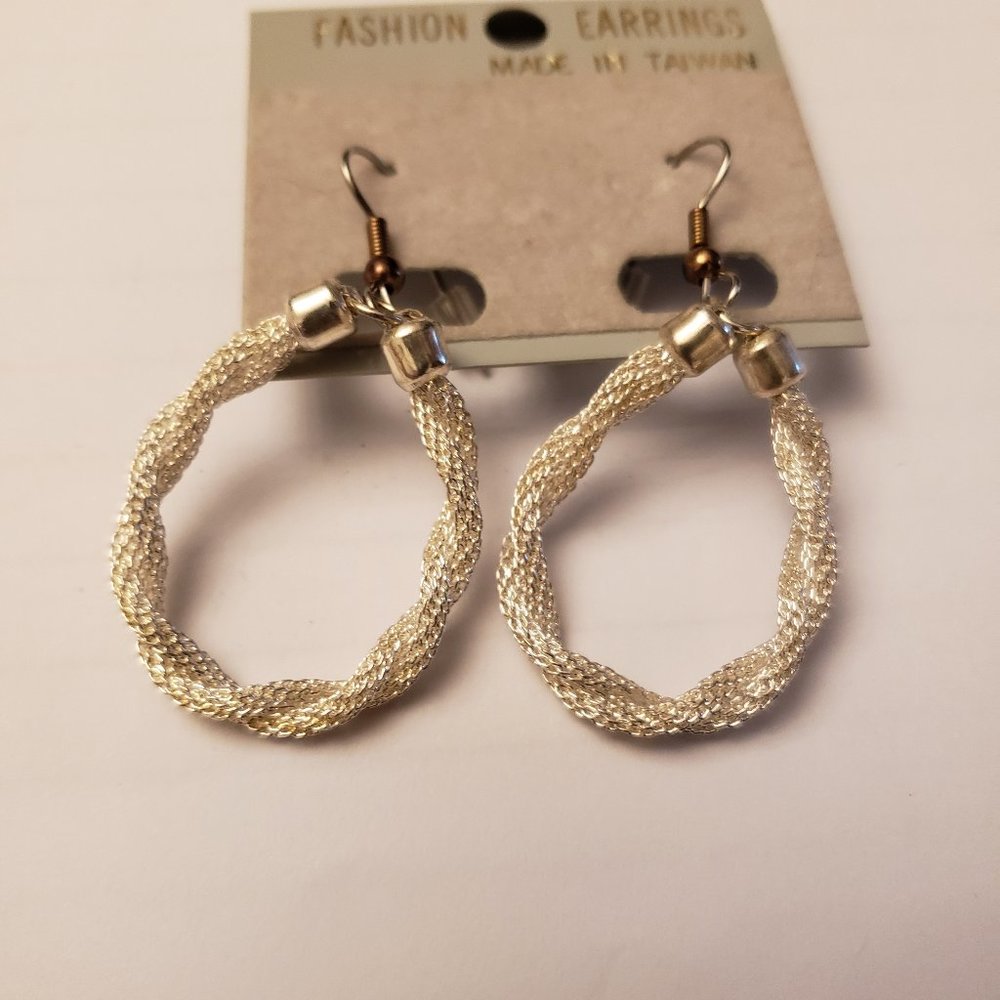 Dazzling silver tone twisted metallic mesh earring